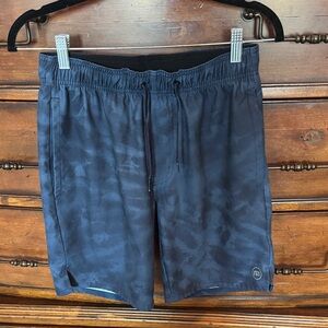 Travis Mathew Deep Blue Shorts with camo like pattern. Mens small.